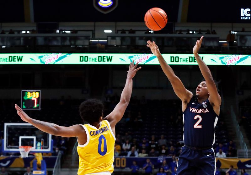 Jan 3, 2023; Pittsburgh, Pennsylvania, USA; Virginia Cavaliers guard Reece Beekman (2) shoots against Pittsburgh Panthers guard Nelly Cummings (0) during the first half at the Petersen Events Center. Mandatory Credit: Charles LeClaire-USA TODAY Sports