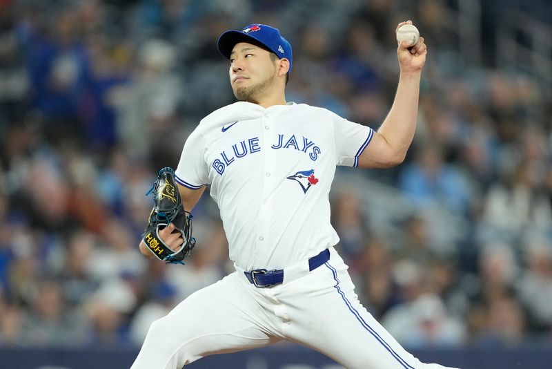 Apr 16, 2024; Toronto, Ontario, CAN; Toronto Blue Jays starting pitcher Yusei Kikuchi (16) pitches to to the New York Yankees during the second inning at Rogers Centre. Mandatory Credit: John E. Sokolowski-USA TODAY Sports