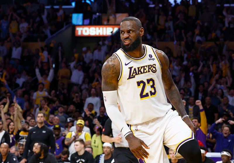 LOS ANGELES, CALIFORNIA - APRIL 27:  LeBron James #23 of the Los Angeles Lakers after making a slam dunk against the Denver Nuggets in the second half during game four of the Western Conference First Round Playoffs at Crypto.com Arena on April 27, 2024 in Los Angeles, California.  NOTE TO USER: User expressly acknowledges and agrees that, by downloading and/or using this photograph, user is consenting to the terms and conditions of the Getty Images License Agreement. (Photo by Ronald Martinez/Getty Images)