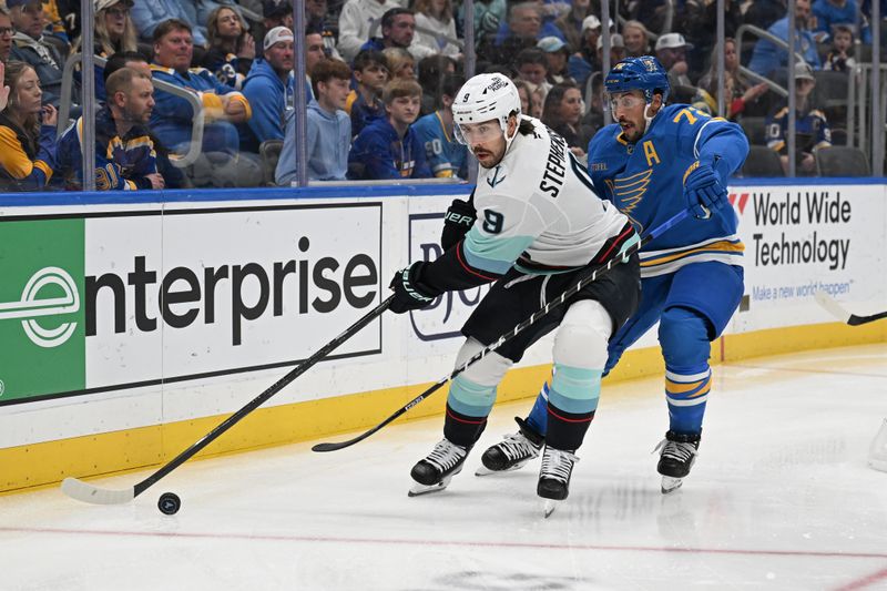 Nov 8, 2025; St. Louis, Missouri, USA; St. Louis Blues defenseman Justin Faulk (72) defends against Seattle Kraken defenseman Cale Fleury (8) in the first period at Enterprise Center. Mandatory Credit: Joe Puetz-Imagn Images