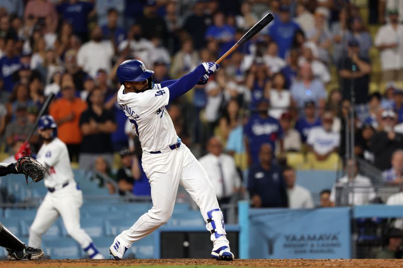 Jul 2, 2024; Los Angeles, California, USA;  Los Angeles Dodgers left fielder Teoscar Hernandez (37) hits a walk off hit to defeat the Arizona Diamondbacks in bottom of the ninth inning at Dodger Stadium. Mandatory Credit: Kiyoshi Mio-USA TODAY Sports