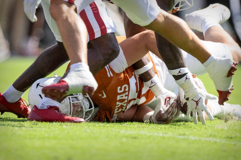 Oct 7, 2023; Dallas, Texas, USA; Oklahoma Sooners wide receiver Trey Brown (85) loses control of the ball after he catches a pass for a first down against the Oklahoma Sooners during the first half at the Cotton Bowl. The play was ruled down by contact. Mandatory Credit: Jerome Miron-USA TODAY Sports