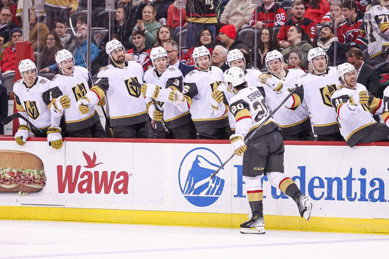 Jan 22, 2024; Newark, New Jersey, USA; Vegas Golden Knights center Chandler Stephenson (20) celebrates his goal with teammates during the second period against the New Jersey Devils at Prudential Center. Mandatory Credit: Vincent Carchietta-USA TODAY Sports