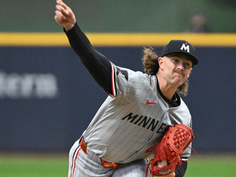 Apr 3, 2024; Milwaukee, Wisconsin, USA; Minnesota Twins starting pitcher Chris Paddack (20) delivers a pitch against the Milwaukee Brewers in the first inning at American Family Field. Mandatory Credit: Michael McLoone-USA TODAY Sports