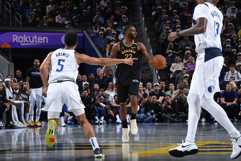 SAN FRANCISCO, CA - NOVEMBER 12: Andrew Wiggins #22 of the Golden State Warriors dribbles the ball during the game against the Dallas Mavericks during the Emirates NBA Cup game on November 12, 2024 at Chase Center in San Francisco, California. NOTE TO USER: User expressly acknowledges and agrees that, by downloading and or using this photograph, user is consenting to the terms and conditions of Getty Images License Agreement. Mandatory Copyright Notice: Copyright 2024 NBAE (Photo by Noah Graham/NBAE via Getty Images)