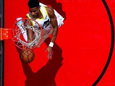 TORONTO, CANADA - DECEMBER 23:  Ochai Agbaji #30 of the Utah Jazz drives to the basket during the game against the Toronto Raptors on December 23, 2023 at the Scotiabank Arena in Toronto, Ontario, Canada.  NOTE TO USER: User expressly acknowledges and agrees that, by downloading and or using this Photograph, user is consenting to the terms and conditions of the Getty Images License Agreement.  Mandatory Copyright Notice: Copyright 2023 NBAE (Photo by Vaughn Ridley/NBAE via Getty Images)