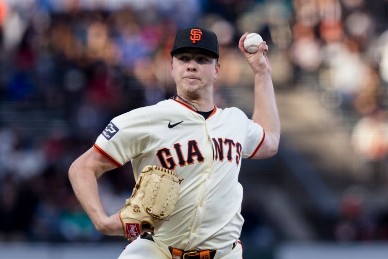 Jun 10, 2024; San Francisco, California, USA; San Francisco Giants starting pitcher Kyle Harrison (45) throws against the Houston Astros during the first inning at Oracle Park. Mandatory Credit: John Hefti-USA TODAY Sports
