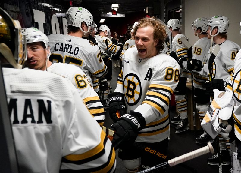 Apr 24, 2024; Toronto, Ontario, CAN; Boston Bruins forward David Pastrnak (88) laughs before warm-up of game three of the first round of the 2024 Stanley Cup Playoffs against the Toronto Maple Leafs at Scotiabank Arena. Mandatory Credit: John E. Sokolowski-USA TODAY Sports