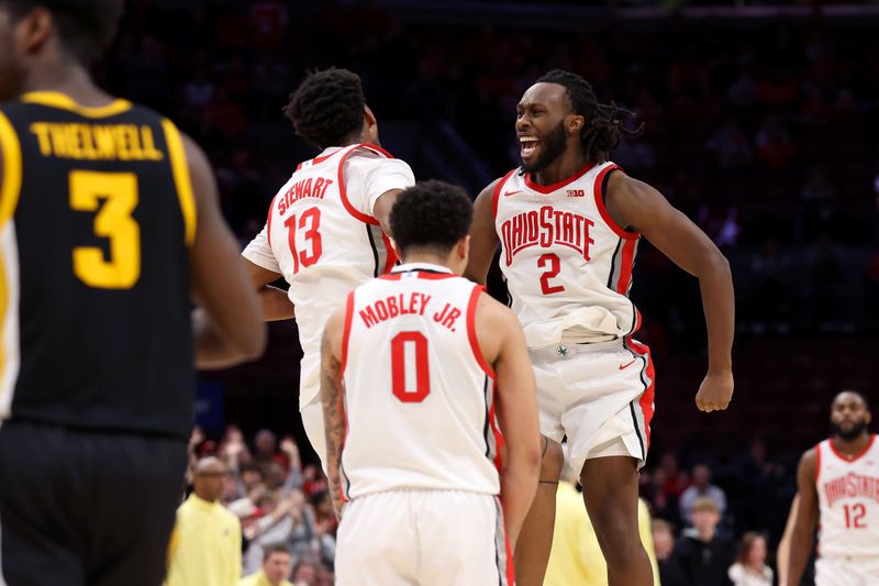 Jan 27, 2025; Columbus, Ohio, USA;  Ohio State Buckeyes guard Bruce Thornton (2) celebrates with Ohio State Buckeyes forward Sean Stewart (13) after his dunk during the second half against the Iowa Hawkeyes at Value City Arena. Mandatory Credit: Joseph Maiorana-Imagn Images