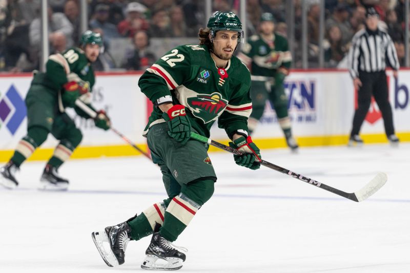 Apr 18, 2024; Saint Paul, Minnesota, USA; Minnesota Wild center Marat Khusnutdinov (22) skates against the Seattle Kraken in the first period at Xcel Energy Center. Mandatory Credit: Matt Blewett-USA TODAY Sports