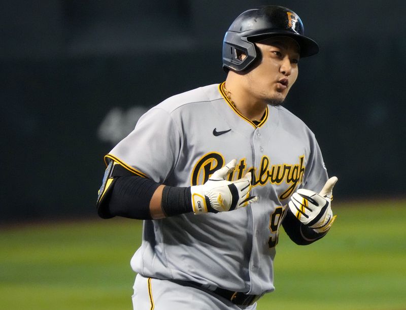 Jul 9, 2023; Phoenix, Arizona, USA;  Pittsburgh Pirates Ji Man Choi (91) trots the bases after his 2-run home run in the second inning against the Arizona Diamondbacks at Chase Field. Mandatory Credit: Joe Rondone-USA TODAY Sports