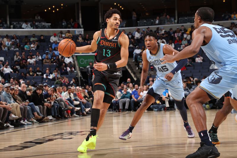 MEMPHIS, TN - MARCH 12: Jordan Poole #13 of the Washington Wizards dribbles the ball during the game against the Memphis Grizzlies on March 12, 2024 at FedExForum in Memphis, Tennessee. NOTE TO USER: User expressly acknowledges and agrees that, by downloading and or using this photograph, User is consenting to the terms and conditions of the Getty Images License Agreement. Mandatory Copyright Notice: Copyright 2024 NBAE (Photo by Joe Murphy/NBAE via Getty Images)