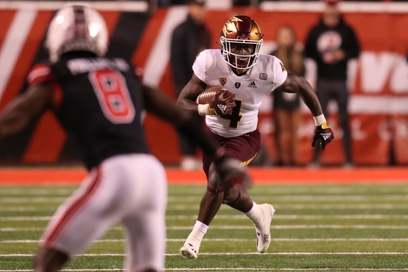 Oct 16, 2021; Salt Lake City, Utah, USA; Arizona State Sun Devils running back Daniyel Ngata (4) runs the ball in the fourth quarter against the Utah Utes at Rice-Eccles Stadium. Mandatory Credit: Rob Gray-USA TODAY Sports