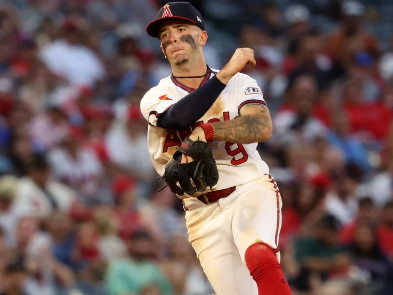 Jul 25, 2024; Anaheim, California, USA;  Los Angeles Angels shortstop Zach Neto (9) throws a ball to the first during the fifth inning against the Oakland Athletics at Angel Stadium. Mandatory Credit: Kiyoshi Mio-USA TODAY Sports