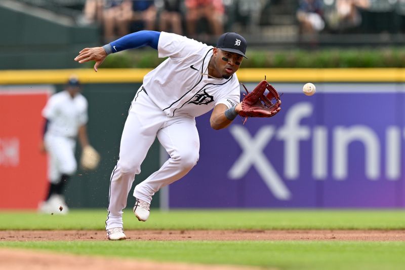 Jun 13, 2024; Detroit, Michigan, USA;  Detroit Tigers second baseman Andy Ibáñez (77) fields a ground ball against the Washington Nationals in the second inning at Comerica Park. Mandatory Credit: Lon Horwedel-USA TODAY Sports