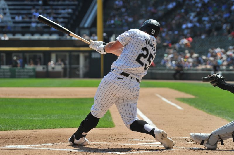 Aug 25, 2024; Chicago, Illinois, USA; Chicago White Sox first base Andrew Vaughn (25) hits an RBI double during the first inning against the Detroit Tigers at Guaranteed Rate Field. Mandatory Credit: Patrick Gorski-USA TODAY Sports