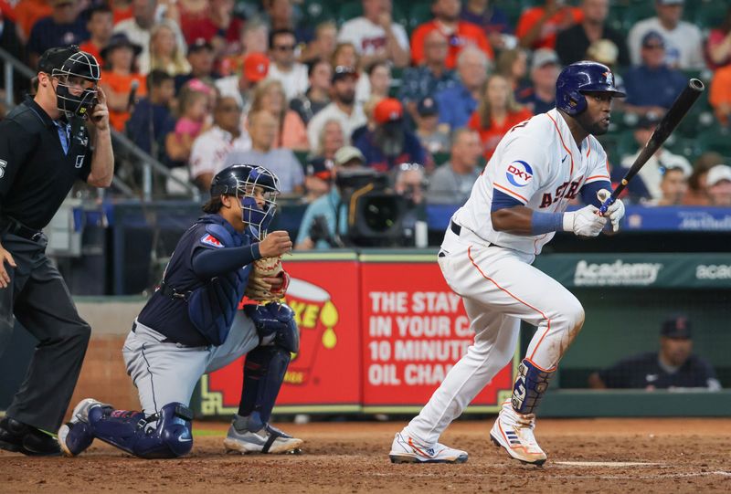 Aug 2, 2023; Houston, Texas, USA; Houston Astros left fielder Yordan Alvarez (44) hits a single against the Cleveland Guardians in the seventh inning at Minute Maid Park. Mandatory Credit: Thomas Shea-USA TODAY Sports