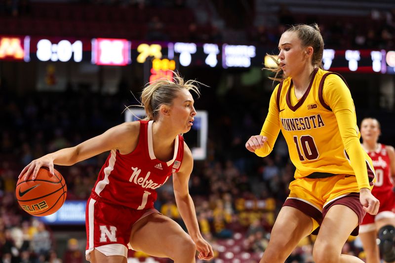 Jan 14, 2024; Minneapolis, Minnesota, USA; Nebraska Cornhuskers guard Jaz Shelley (1) controls the ball as Minnesota Golden Gophers guard Mara Braun (10) defends during the second half at Williams Arena. Mandatory Credit: Matt Krohn-USA TODAY Sports