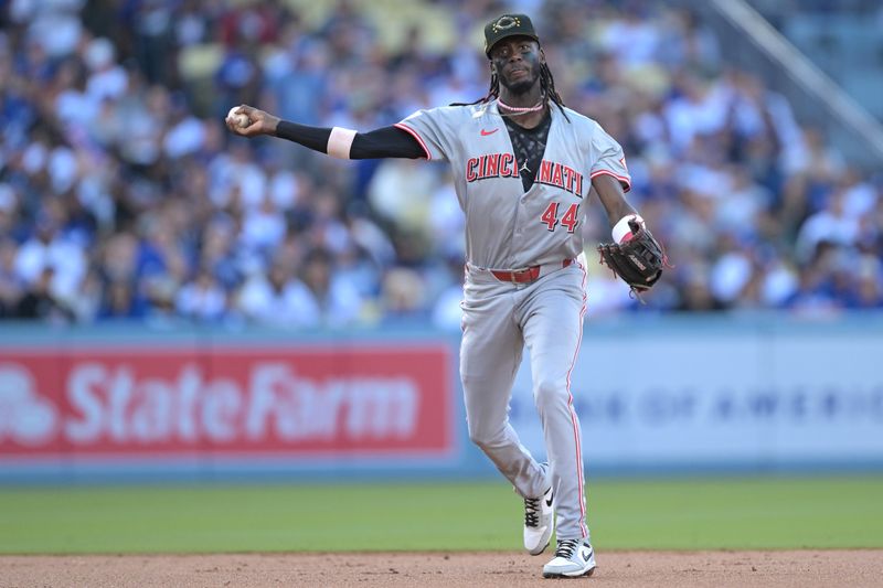 May 18, 2024; Los Angeles, California, USA;  Cincinnati Reds shortstop Elly De La Cruz (44) throws to first for an out in the second inning against the Los Angeles Dodgers at Dodger Stadium. Mandatory Credit: Jayne Kamin-Oncea-USA TODAY Sports