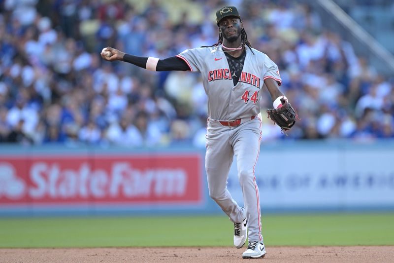 May 18, 2024; Los Angeles, California, USA;  Cincinnati Reds shortstop Elly De La Cruz (44) throws to first for an out in the second inning against the Los Angeles Dodgers at Dodger Stadium. Mandatory Credit: Jayne Kamin-Oncea-USA TODAY Sports