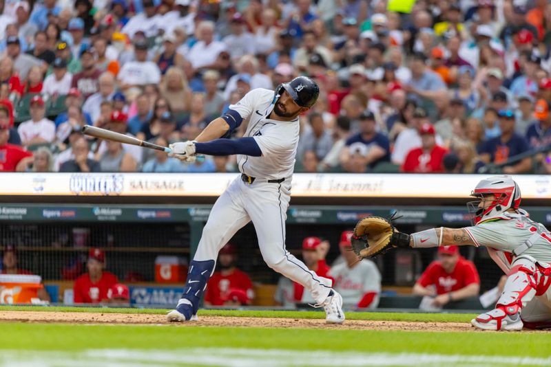 Jun 25, 2024; Detroit, Michigan, USA; Detroit Tigers outfielder Riley Greene (31) hits an RBI triple in the fifth inning against the Philadelphia Phillies at Comerica Park. Mandatory Credit: David Reginek-USA TODAY Sports