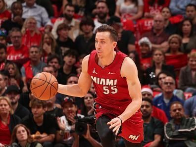 MIAMI, FL - DECEMBER 25:  Duncan Robinson #55 of the Miami Heat handles the ball during the game  on December 25, 2023 at Kaseya Center Arena in Miami, Florida. NOTE TO USER: User expressly acknowledges and agrees that, by downloading and or using this Photograph, user is consenting to the terms and conditions of the Getty Images License Agreement. Mandatory Copyright Notice: Copyright 2023 NBAE (Photo by Issac Baldizon/NBAE via Getty Images)