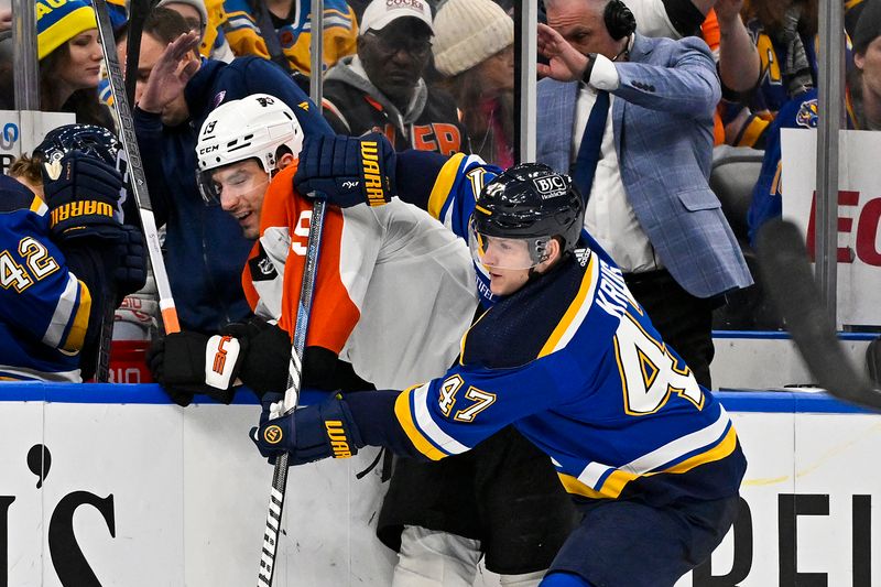 Jan 15, 2024; St. Louis, Missouri, USA;  St. Louis Blues defenseman Torey Krug (47) checks Philadelphia Flyers right wing Garnet Hathaway (19) during the third period at Enterprise Center. Mandatory Credit: Jeff Curry-USA TODAY Sports