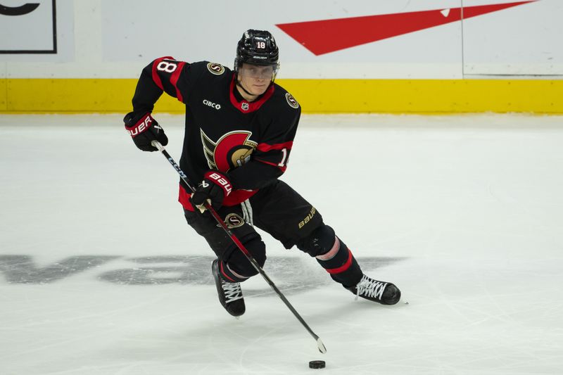 Dec 5, 2024; Ottawa, Ontario, CAN; Ottawa Senators center Tim Stutzle (18) skates with the puck in the third period against the  Detroit Red Wings at the Canadian Tire Centre. Mandatory Credit: Marc DesRosiers-Imagn Images