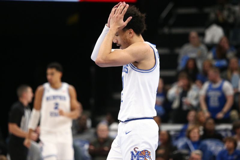 Jan 31, 2024; Memphis, Tennessee, USA; Memphis Tigers guard Jahvon Quinerly (11) reacts during the second half against the Rice Owls at FedExForum. Mandatory Credit: Petre Thomas-USA TODAY Sports