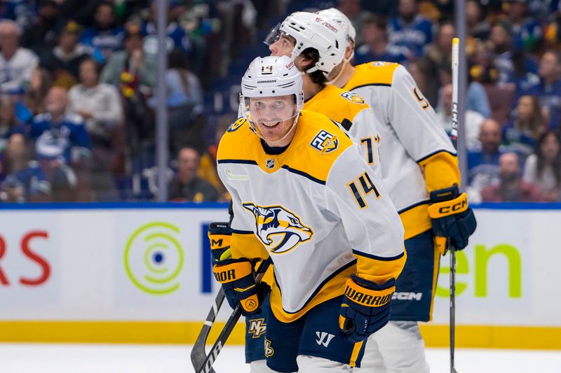 Apr 21, 2024; Vancouver, British Columbia, CAN; Nashville Predators forward Gustav Nyquist (14) celebrates a goal scored by forward Ryan O'Reilly (90) against the Vancouver Canucks in the second period in game one of the first round of the 2024 Stanley Cup Playoffs at Rogers Arena. Mandatory Credit: Bob Frid-USA TODAY Sports