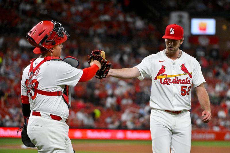 May 6, 2025; St. Louis, Missouri, USA;  St. Louis Cardinals starting pitcher Matthew Liberatore (52) celebrates with catcher Yohel Pozo (63) as they walk off the field after the seventh inning against the Pittsburgh Pirates at Busch Stadium. Mandatory Credit: Jeff Curry-Imagn Images