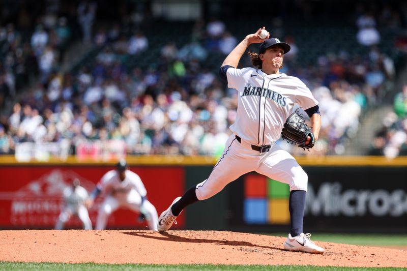 Aug 7, 2025; Seattle, Washington, USA; Seattle Mariners starting pitcher Logan Gilbert (36) pitches the ball during the second inning against the Seattle Mariners at T-Mobile Park. Mandatory Credit: Kevin Ng-Imagn Images