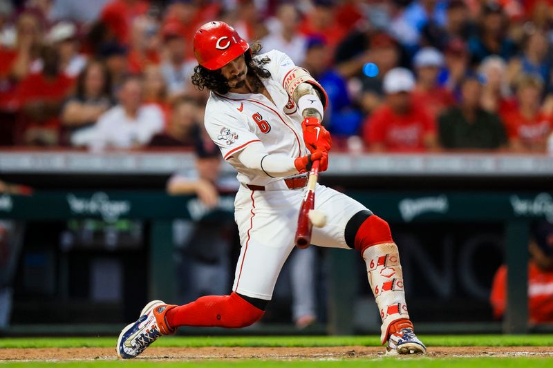 Aug 14, 2024; Cincinnati, Ohio, USA; Cincinnati Reds second baseman Jonathan India (6) hits a single in the sixth inning against the St. Louis Cardinals at Great American Ball Park. Mandatory Credit: Katie Stratman-USA TODAY Sports