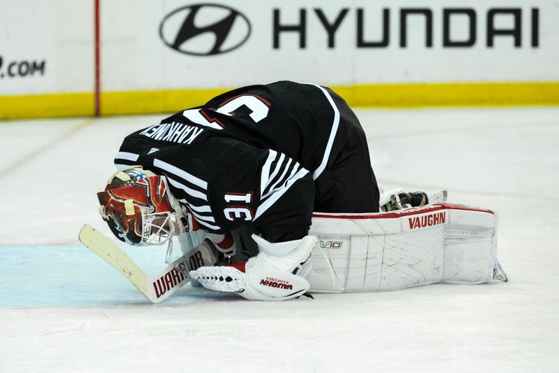 Apr 7, 2024; Newark, New Jersey, USA; New Jersey Devils goaltender Kaapo Kahkonen (31) reacts after an injury during the first period against the Nashville Predators at Prudential Center. Mandatory Credit: John Jones-USA TODAY Sports