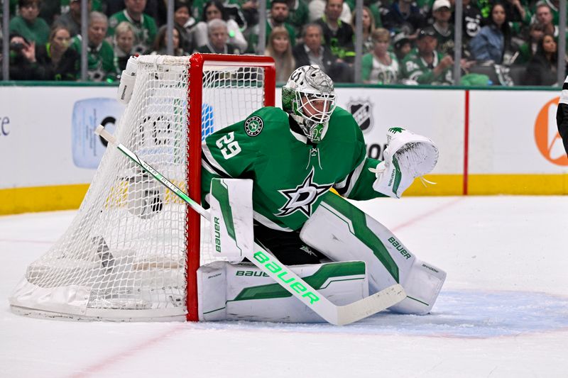 May 11, 2025; Dallas, Texas, USA; Dallas Stars goaltender Jake Oettinger (29) faces the Winnipeg Jets attack during the first period in game three of the second round of the 2025 Stanley Cup Playoffs at American Airlines Center. Mandatory Credit: Jerome Miron-Imagn Images