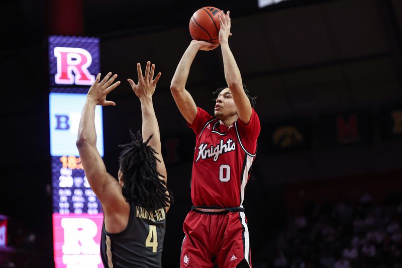 Jan 28, 2024; Piscataway, New Jersey, USA; Rutgers Scarlet Knights guard Derek Simpson (0) shoots the ball as Purdue Boilermakers forward Trey Kaufman-Renn (4) defends during the second half at Jersey Mike's Arena. Mandatory Credit: Vincent Carchietta-USA TODAY Sports