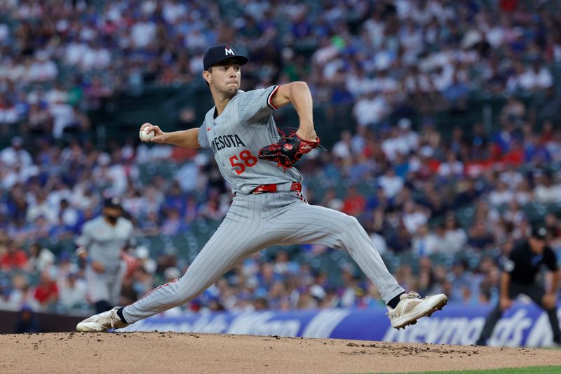 Aug 5, 2024; Chicago, Illinois, USA; Minnesota Twins starting pitcher David Festa (58) delivers a pitch against the Chicago Cubs during the first inning at Wrigley Field. Mandatory Credit: Kamil Krzaczynski-USA TODAY Sports