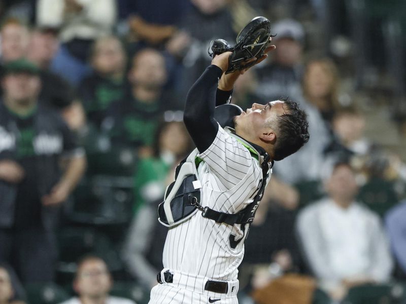 Sep 16, 2023; Chicago, Illinois, USA; Chicago White Sox catcher Carlos Perez (36) catches a fly ball hit by Minnesota Twins catcher Christian Vazquez during the eighth inning at Guaranteed Rate Field. Mandatory Credit: Kamil Krzaczynski-USA TODAY Sports