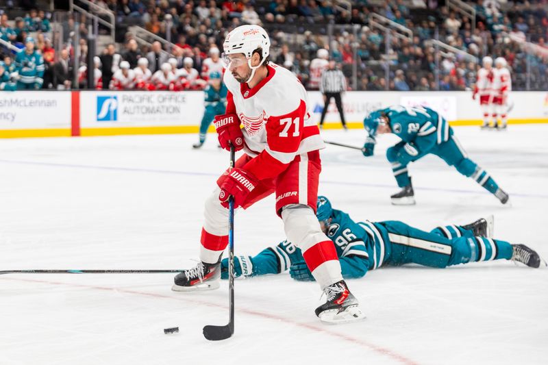 Nov 18, 2024; San Jose, California, USA; Detroit Red Wings center Dylan Larkin (71) skates with the puck during the first period against the San Jose Sharks at SAP Center at San Jose. Mandatory Credit: Bob Kupbens-Imagn Images