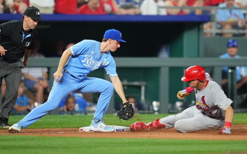 Aug 11, 2023; Kansas City, Missouri, USA; St. Louis Cardinals center fielder Lars Nootbaar (21) is caught trying to stretch a double against Kansas City Royals third baseman Matt Duffy (15) during the sixth inning at Kauffman Stadium. Mandatory Credit: Jay Biggerstaff-USA TODAY Sports