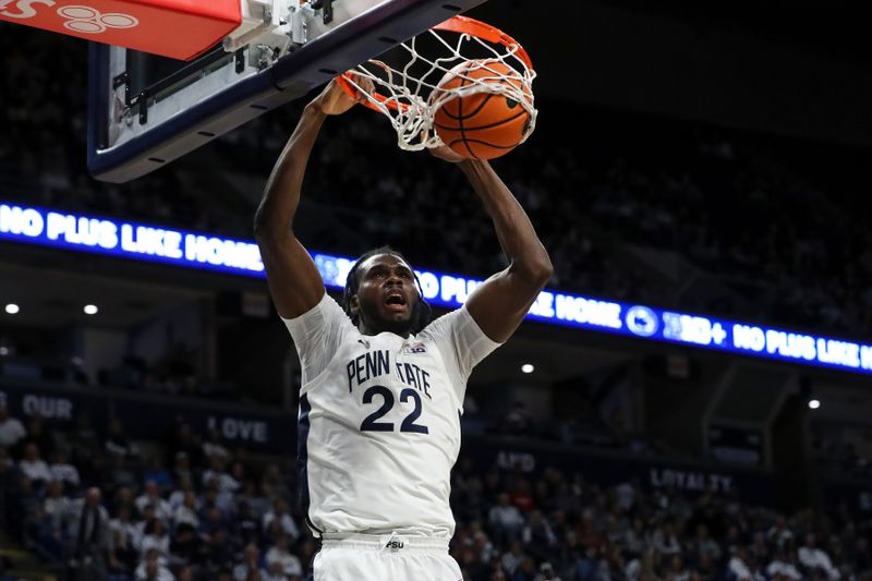 Jan 27, 2024; University Park, Pennsylvania, USA; Penn State Nittany Lions forward Qudus Wahab (22) dunks the ball during the first half against the Minnesota Golden Gophers at Bryce Jordan Center. Mandatory Credit: Matthew O'Haren-USA TODAY Sports