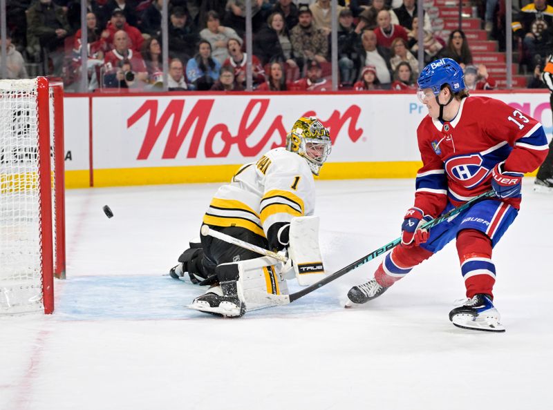 Nov 15, 2025; Montreal, Quebec, CAN; Montreal Canadiens forward Cole Caufield (13) scores a goal against Boston Bruins goalie Jeremy Swayman (1) during the second period at the Bell Centre. Mandatory Credit: Eric Bolte-Imagn Images