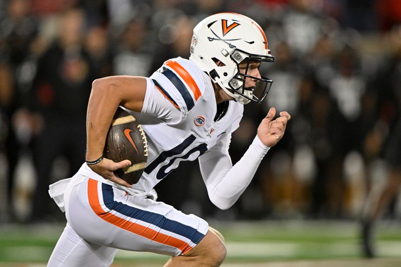 Nov 9, 2023; Louisville, Kentucky, USA; Virginia Cavaliers quarterback Anthony Colandrea (10) runs the ball against the Louisville Cardinals during the first quarter at L&N Federal Credit Union Stadium. Mandatory Credit: Jamie Rhodes-USA TODAY Sports