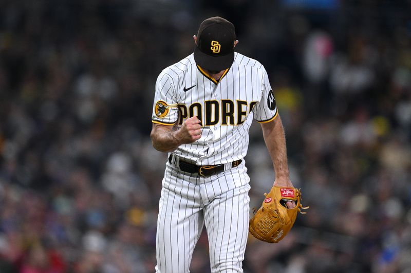 Jul 8, 2023; San Diego, California, USA; San Diego Padres relief pitcher Nick Martinez (21) reacts after a strikeout to end the top of the eighth inning against the New York Mets at Petco Park. Mandatory Credit: Orlando Ramirez-USA TODAY Sports