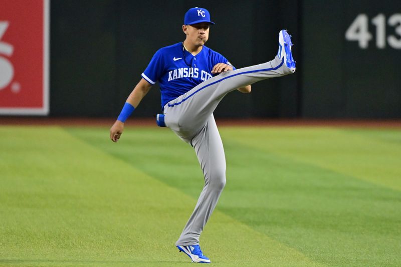 Apr 26, 2023; Phoenix, Arizona, USA; Kansas City Royals third baseman Nicky Lopez (8) warms up prior to the game against the Arizona Diamondbacks at Chase Field. Mandatory Credit: Matt Kartozian-USA TODAY Sports