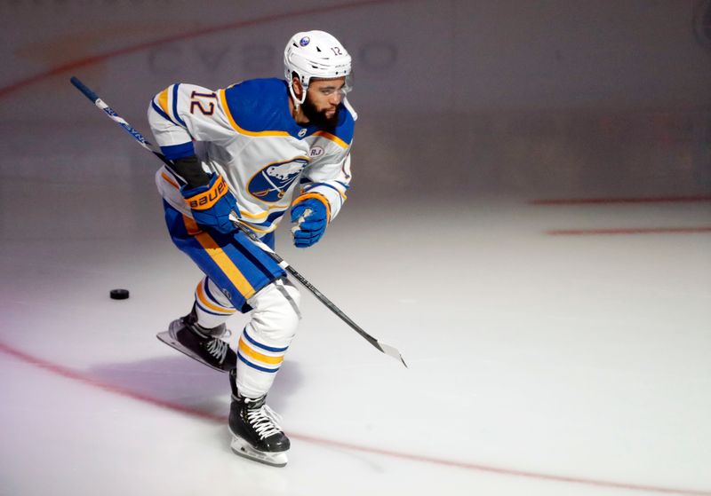 Jan 6, 2024; Pittsburgh, Pennsylvania, USA;  Buffalo Sabres left wing Jordan Greenway (12) takes the ice to warm up before the game against the Pittsburgh Penguins at PPG Paints Arena. Mandatory Credit: Charles LeClaire-USA TODAY Sports