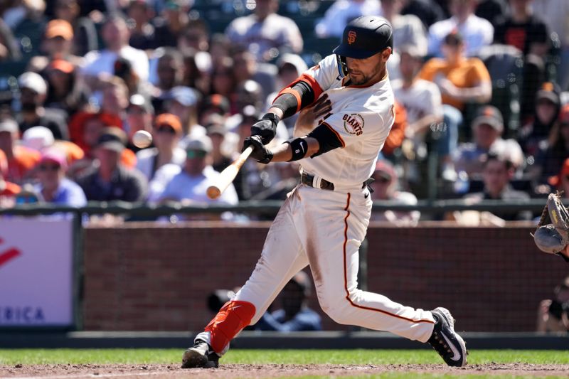 Apr 9, 2023; San Francisco, California, USA; San Francisco Giants right fielder Michael Conforto (8) hits a home run against the Kansas City Royals during the eighth inning at Oracle Park. Mandatory Credit: Darren Yamashita-USA TODAY Sports