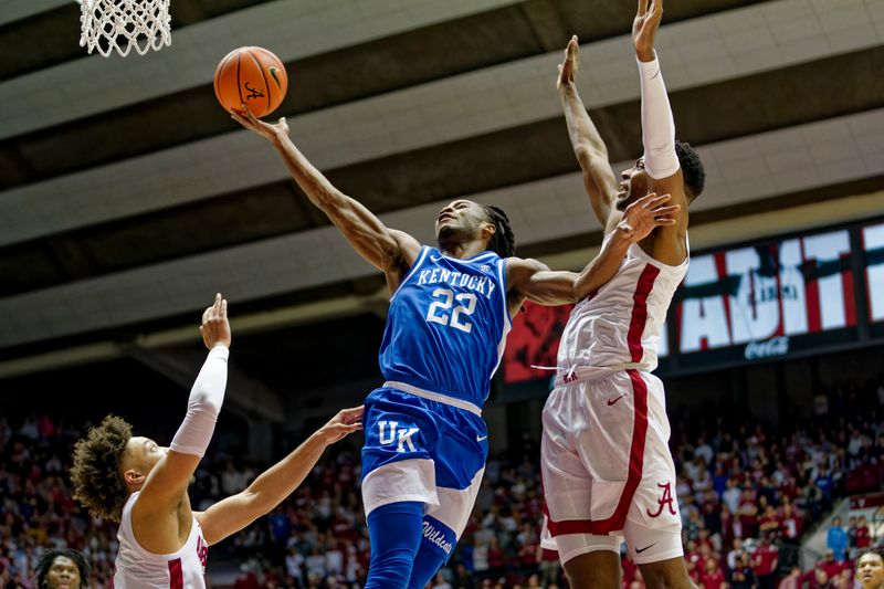 Jan 7, 2023; Tuscaloosa, Alabama, USA; Kentucky Wildcats guard Cason Wallace (22) shoots against Alabama Crimson Tide guard Mark Sears (1) and Alabama Crimson Tide forward Brandon Miller (24) during first half at Coleman Coliseum. Mandatory Credit: Marvin Gentry-USA TODAY Sports