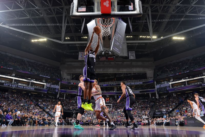 SACRAMENTO, CA - FEBRUARY 22: De'Aaron Fox #5 of the Sacramento Kings goes up for the rebound during the game against the San Antonio Spurs on February 22, 2024 at Golden 1 Center in Sacramento, California. NOTE TO USER: User expressly acknowledges and agrees that, by downloading and or using this Photograph, user is consenting to the terms and conditions of the Getty Images License Agreement. Mandatory Copyright Notice: Copyright 2023 NBAE (Photo by Rocky Widner/NBAE via Getty Images)