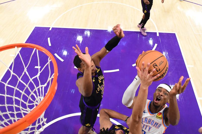 LOS ANGELES, CA - JANUARY 15: Shai Gilgeous-Alexander #2 of the Oklahoma City Thunder drives to the basket during the game against the Los Angeles Lakers on January 15, 2024 at Crypto.Com Arena in Los Angeles, California. NOTE TO USER: User expressly acknowledges and agrees that, by downloading and/or using this Photograph, user is consenting to the terms and conditions of the Getty Images License Agreement. Mandatory Copyright Notice: Copyright 2024 NBAE (Photo by Adam Pantozzi/NBAE via Getty Images)